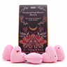 Heart-shaped bath bombs with a decorative box labeled 'Enchanting Heart Haven' on a white background.